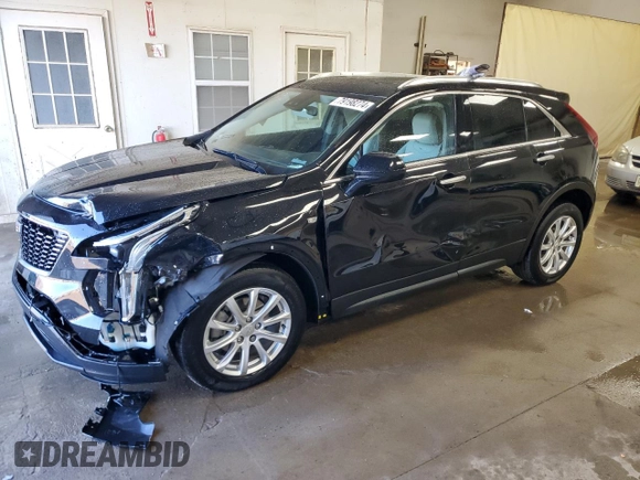 2022 Cadillac XT4 AWD Luxury with VIN 1GYFZBR45NF145986, listed as a Copart auction lot 79198274 with 23,477 mi miles and Salvage Title. Bid and sale history available at carsss.com. Image 1.