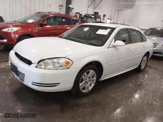 2016 Chevrolet Impala Limited LT with VIN 2G1WB5E36G1128352, listed as a IAAI auction lot 41763988 with 214,786 mi miles. Bid and sale history available at carsss.com. Image 2.