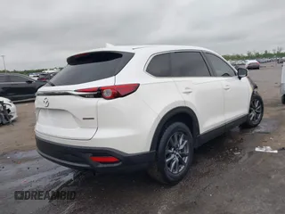 2022 Mazda CX-9 Sport with VIN JM3TCBBYXN0603510, listed as a IAAI auction lot 42027879 with Not provided miles and . Bid and sale history available at DreamBid. Image 4.