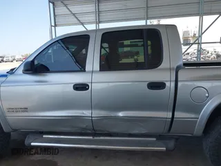 2002 Dodge Dakota SLT with VIN 1B7HG48N62S546119, listed as a IAAI auction lot 41826998 with 157,761 mi miles. Bid and sale history available at carsss.com. Image 14.
