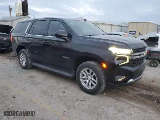 2021 Chevrolet Tahoe LS with VIN 1GNSKMKD3MR163423, listed as a Copart auction lot 84880594 with 119,407 mi miles and Salvage Title. Bid and sale history available at carsss.com. Image 4.