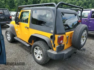 2012 Jeep Wrangler Sport with VIN 1C4AJWAG6CL247929, listed as a Copart auction lot 58942515 with 113,833 mi miles and Salvage title. Bid and sale history available at DreamBid. Image 2.