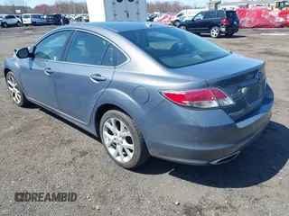 2009 Mazda 6 S Grand Touring with VIN 1YVHP82B795M01762, listed as a IAAI auction lot 41925269 with 163,967 mi miles and . Bid and sale history available at DreamBid. Image 3.