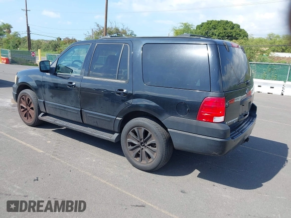 2003 Ford Expedition XLT Value with VIN 1FMPU16W73LC19198, listed as a IAAI auction lot 41570000 with 111,893 mi miles. Bid and sale history available at carsss.com. Image 3.