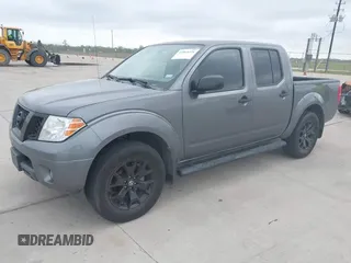 2020 Nissan Frontier SV with VIN 1N6ED0EA2LN701042, listed as a IAAI auction lot 41865224 with 67,910 mi miles and . Bid and sale history available at DreamBid. Image 2.