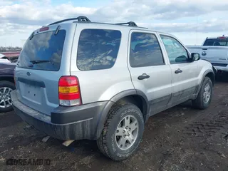 2003 Ford Escape XLT Popular 2 with VIN 1FMCU93153KA91250, listed as a IAAI auction lot 41700796 with 122,172 mi miles. Bid and sale history available at carsss.com. Image 4.