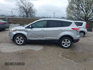 2016 Ford Escape SE with VIN 1FMCU9GX3GUA96262, listed as a IAAI auction lot 41915524 with 64,434 mi miles and . Bid and sale history available at DreamBid. Image 14.