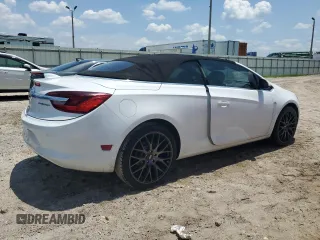 2016 Buick Cascada Premium с VIN W04WT3N57GG152036, выставлен на аукционе Copart как лот 67237824 с пробегом 70 623 миль миль и Списание • Salvage title. История ставок и продаж доступна на DreamBid. Изображение 3.