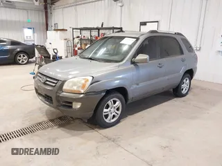 2005 Kia Sportage LX with VIN KNDJE723157089856, listed as a IAAI auction lot 41826630 with 200,380 mi miles and . Bid and sale history available at carsss.com. Image 2.
