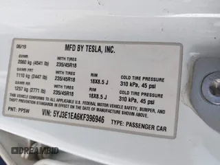 2019 Tesla Model 3 Mid Range with VIN 5YJ3E1EA6KF396946, listed as a IAAI auction lot 41123058 with 69,013 mi miles and . Bid and sale history available at carsss.com. Image 9.