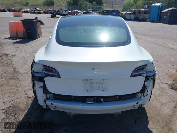 2018 Tesla Model 3 Long Range Battery with VIN 5YJ3E1EAXJF108781, listed as a IAAI auction lot 41962628 with 61,208 mi miles and . Bid and sale history available at DreamBid. Image 17.
