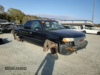 2003 GMC Sierra Denali z VIN 2GTFK69U031261036, wystawiony jako Copart lot #75353324 z przebiegiem 192 762 mil mil oraz Szkody całkowita. Historia ofert i sprzedaży dostępna na DreamBid. Obrazek 11.