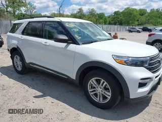 2021 Ford Explorer XLT z VIN 1FMSK8DH5MGA54632, wystawiony jako IAAI lot #42229993 z przebiegiem 34 304 mil mil oraz . Historia ofert i sprzedaży dostępna na DreamBid. Obrazek 1.