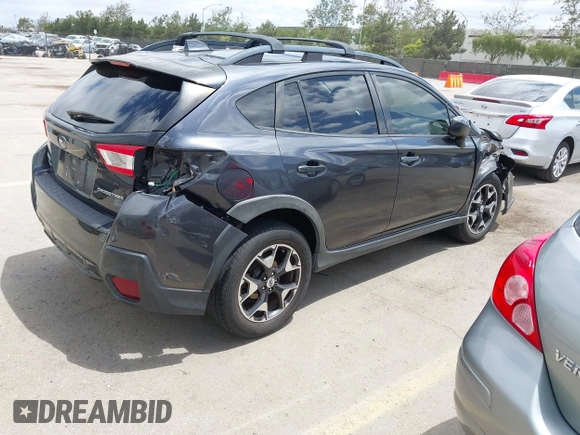 2018 Subaru Crosstrek Premium z VIN JF2GTACC9JH215303, wystawiony jako IAAI lot #42228185 z przebiegiem 71 170 mil mil oraz . Historia ofert i sprzedaży dostępna na DreamBid. Obrazek 4.