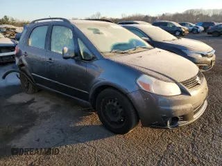 2010 Suzuki SX4 with VIN JS2YB5A31A6300055, listed as a Copart auction lot 82596904 with 80,715 mi miles and Salvage Title. Bid and sale history available at carsss.com. Image 4.