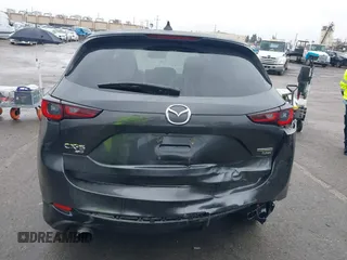 2022 Mazda CX-5 2.5 Turbo with VIN JM3KFBAY8N0647204, listed as a IAAI auction lot 41567490 with 40,396 mi miles and . Bid and sale history available at carsss.com. Image 16.