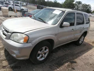 2006 Mazda Tribute LX with VIN 4F2YZ94156KM00763, listed as a IAAI auction lot 42019156 with 229,858 mi miles. Bid and sale history available at carsss.com. Image 2.