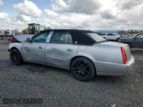 2006 Cadillac DTS 1SC z VIN 1G6KD57Y16U227899, wystawiony jako Copart lot #51848255 z przebiegiem Nie podano mil oraz Szkoda całkowita • Salvage title. Historia ofert i sprzedaży dostępna na DreamBid. Obrazek 2.