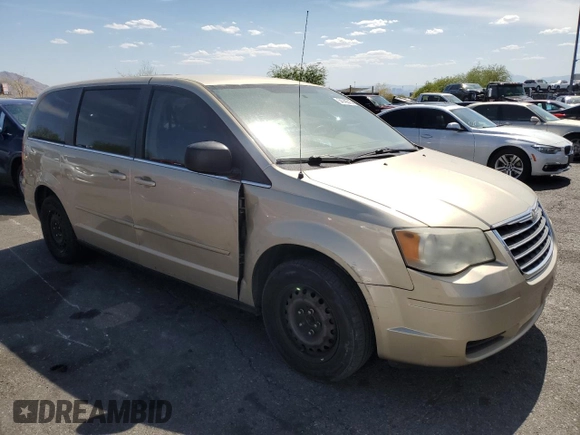 2010 Chrysler Town & Country LX with VIN 2A4RR4DE0AR188949, listed as a Copart auction lot 54140515 with 185,534 mi miles and Salvage Title. Bid and sale history available at DreamBid. Image 4.