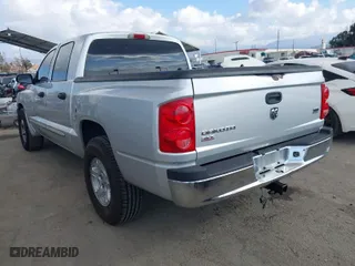 2006 Dodge Dakota SLT with VIN 1D7HE48N26S634019, listed as a IAAI auction lot 41558252 with 203,745 mi miles. Bid and sale history available at carsss.com. Image 3.