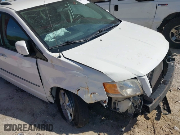 2010 Dodge Grand Caravan SXT with VIN 2D4RN5D1XAR462150, listed as a IAAI auction lot 41466381 with 204,531 mi miles and . Bid and sale history available at DreamBid. Image 13.