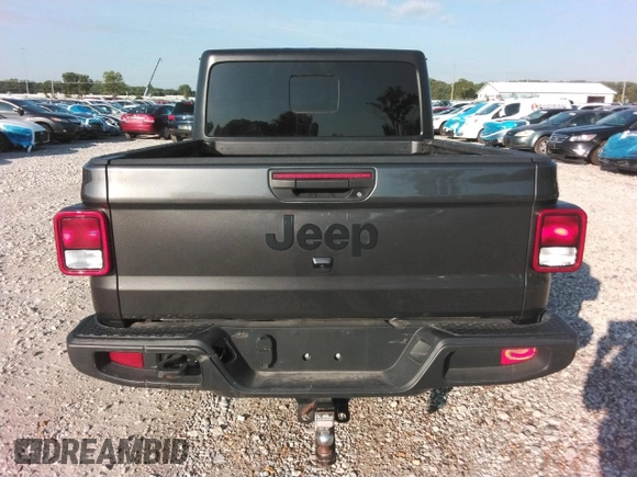 2021 Jeep Gladiator 80th Anniversary with VIN 1C6HJTAG7ML619025, listed as a Copart auction lot 63309365 with 69,126 mi miles and Salvage title. Bid and sale history available at DreamBid. Image 6.