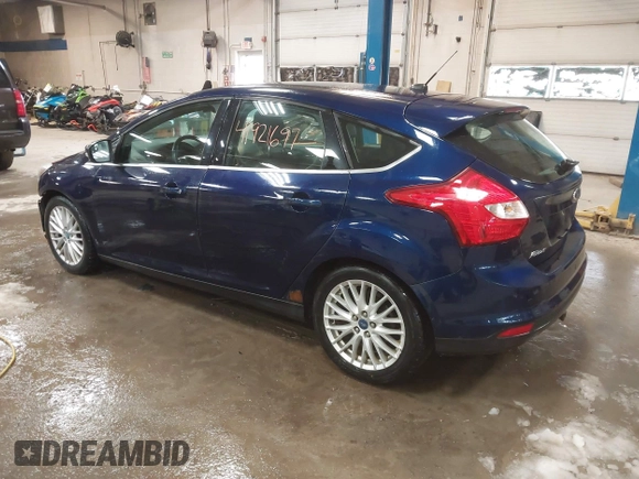 2012 Ford Focus SEL with VIN 1FAHP3M23CL137776, listed as a IAAI auction lot 41921697 with 189,217 mi miles. Bid and sale history available at carsss.com. Image 3.