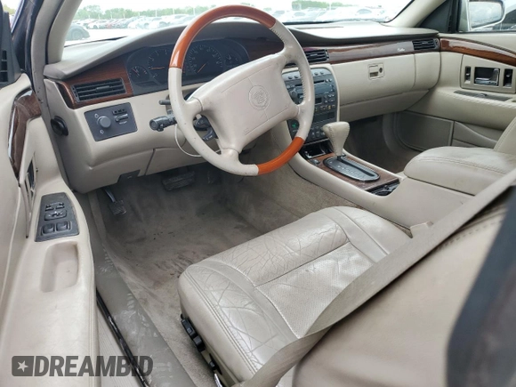 2000 Cadillac Eldorado Touring with VIN 1G6ET1298YB702875, listed as a Copart auction lot 54434255 with 135,282 mi miles and Salvage Title. Bid and sale history available at DreamBid. Image 8.