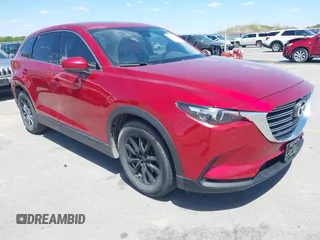 2016 Mazda CX-9 Touring with VIN JM3TCBCY5G0104504, listed as a IAAI auction lot 42314649 with 116,536 mi miles and . Bid and sale history available at DreamBid. Image 1.
