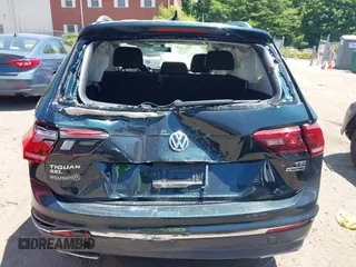 2018 Volkswagen Tiguan SEL with VIN 3VV2B7AX9JM058518, listed as a IAAI auction lot 42558129 with 82,807 mi miles and . Bid and sale history available at DreamBid. Image 16.