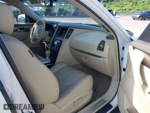2010 Infiniti FX z VIN JN8AS1MUXAM800384, wystawiony jako IAAI lot #42458960 z przebiegiem 142 976 mil mil oraz . Historia ofert i sprzedaży dostępna na DreamBid. Obrazek 5.