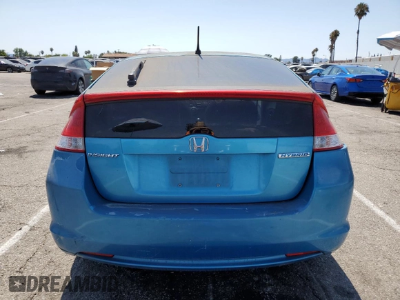 2010 Honda Insight LX with VIN JHMZE2H51AS028849, listed as a Copart auction lot 65547805 with 209,316 mi miles and Salvage title. Bid and sale history available at DreamBid. Image 6.