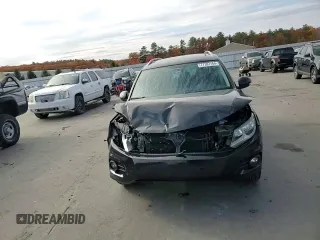 2013 Volkswagen Tiguan SE z VIN WVGBV7AXXDW534779, wystawiony jako Copart lot #77397164 z przebiegiem 149 285 mil mil oraz Szkoda całkowita • Salvage title. Historia ofert i sprzedaży dostępna na DreamBid. Obrazek 12.