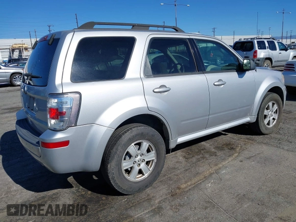 2011 Mercury Mariner z VIN 4M2CN8B70BKJ04853, wystawiony jako IAAI lot #41345383 z przebiegiem 259 727 mil mil oraz . Historia ofert i sprzedaży dostępna na DreamBid. Obrazek 4.