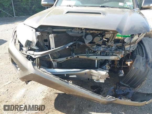 2015 Toyota Tacoma with VIN 3TMMU4FN5FM082376, listed as a IAAI auction lot 42144113 with 98,244 mi miles and . Bid and sale history available at DreamBid. Image 6.