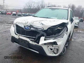 2019 Subaru Forester Touring with VIN JF2SKAWC3KH555900, listed as a IAAI auction lot 41558281 with 138,351 mi miles. Bid and sale history available at carsss.com. Image 6.