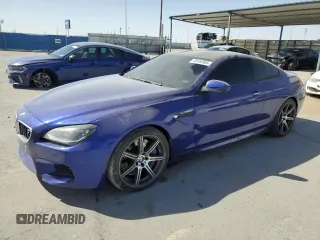 2014 BMW M6 z VIN WBSLX9C5XED160190, wystawiony jako Copart lot #48160905 z przebiegiem 47 034 mil mil oraz Szkody całkowita. Historia ofert i sprzedaży dostępna na DreamBid. Obrazek 1.