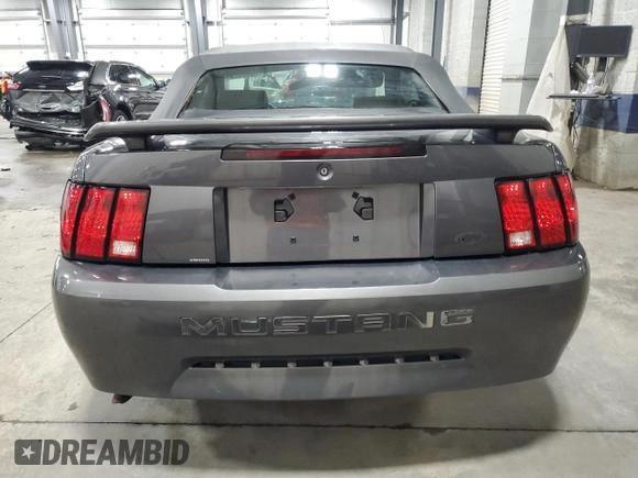 2003 Ford Mustang Deluxe z VIN 1FAFP44433F369534, wystawiony jako Copart lot #76606794 z przebiegiem 88 503 mil mil oraz Szkoda całkowita • Salvage title. Historia ofert i sprzedaży dostępna na DreamBid. Obrazek 6.