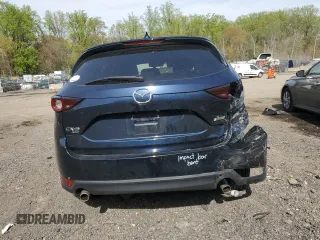 2019 Mazda CX-5 Touring with VIN JM3KFBCM6K0591608, listed as a Copart auction lot 53518385 with 61,618 mi miles and Salvage Title. Bid and sale history available at carsss.com. Image 6.