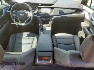 2024 Cadillac XT6 FWD Premium Luxury with VIN 1GYKPCRS7RZ711983, listed as a Copart auction lot 64842625 with 6,394 mi miles and Clean title. Bid and sale history available at DreamBid. Image 8.