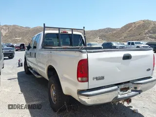 2004 Ford F-350 XL with VIN 1FTSW31P84ED21703, listed as a IAAI auction lot 42644063 with 297,096 mi miles and . Bid and sale history available at DreamBid. Image 3.