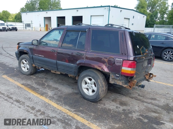 1997 Jeep Grand Cherokee Laredo with VIN 1J4GZ58S0VC708420, listed as a IAAI auction lot 42624603 with Not provided miles and . Bid and sale history available at DreamBid. Image 3.