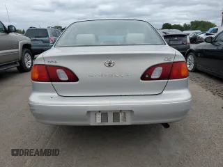1999 Toyota Corolla VE with VIN 1NXBR12E3XZ153645, listed as a Copart auction lot 61005465 with Not provided miles and Clean title. Bid and sale history available at DreamBid. Image 6.