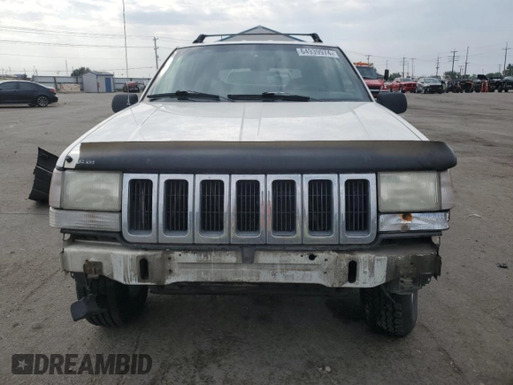 1997 Jeep Grand Cherokee Laredo with VIN 1J4GZ58S2VC676652, listed as a Copart auction lot 64939974 with 256,923 mi miles and Salvage Title. Bid and sale history available at carsss.com. Image 5.