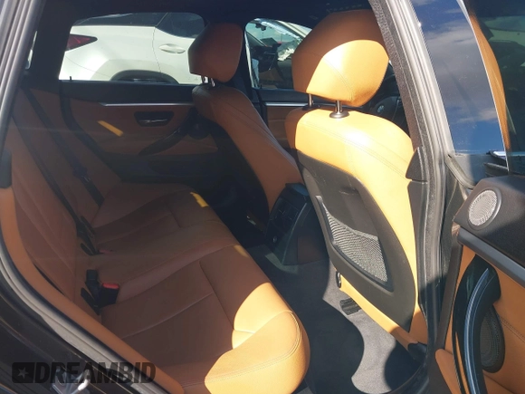 2018 BMW 4 Series 430i xDrive with VIN WBA4J3C54JBG95242, listed as a IAAI auction lot 41180565 with 83,710 mi miles and . Bid and sale history available at DreamBid. Image 8.