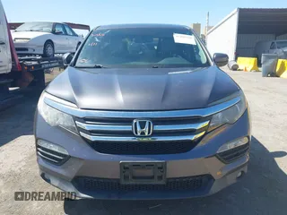 2017 Honda Pilot EX-L with VIN 5FNYF6H59HB032480, listed as a IAAI auction lot 42488789 with 112,595 mi miles and . Bid and sale history available at DreamBid. Image 12.