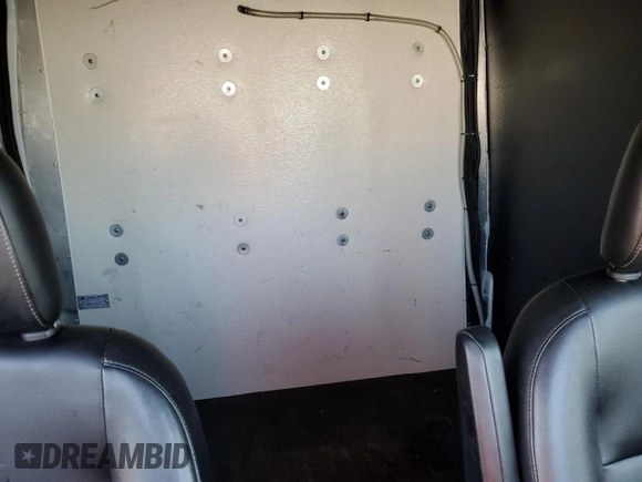 2020 Ford Transit Cargo with VIN 1FTBF4XG3LKB70573, listed as a Copart auction lot 77039474 with 131,873 mi miles and Salvage Title. Bid and sale history available at DreamBid. Image 10.