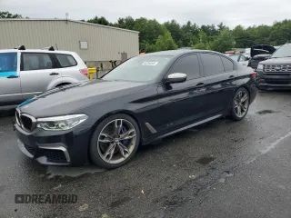 2019 BMW 5 Series M550i xDrive z VIN WBAJB9C5XKB464119, wystawiony jako Copart lot #60294545 z przebiegiem 98 864 mil mil oraz Szkoda całkowita • Salvage title. Historia ofert i sprzedaży dostępna na DreamBid. Obrazek 1.