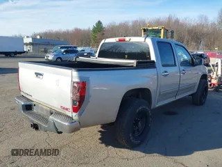 2012 GMC Canyon SLE1 with VIN 1GTH6MFE2C8106354, listed as a IAAI auction lot 41910921 with 127,812 mi miles. Bid and sale history available at carsss.com. Image 4.