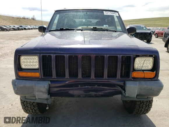 1999 Jeep Cherokee Sport z VIN 1J4FF68S8XL604061, wystawiony jako Copart lot #53175345 z przebiegiem 206 698 mil mil oraz Nie do naprawy • Non repairable. Historia ofert i sprzedaży dostępna na DreamBid. Obrazek 5.